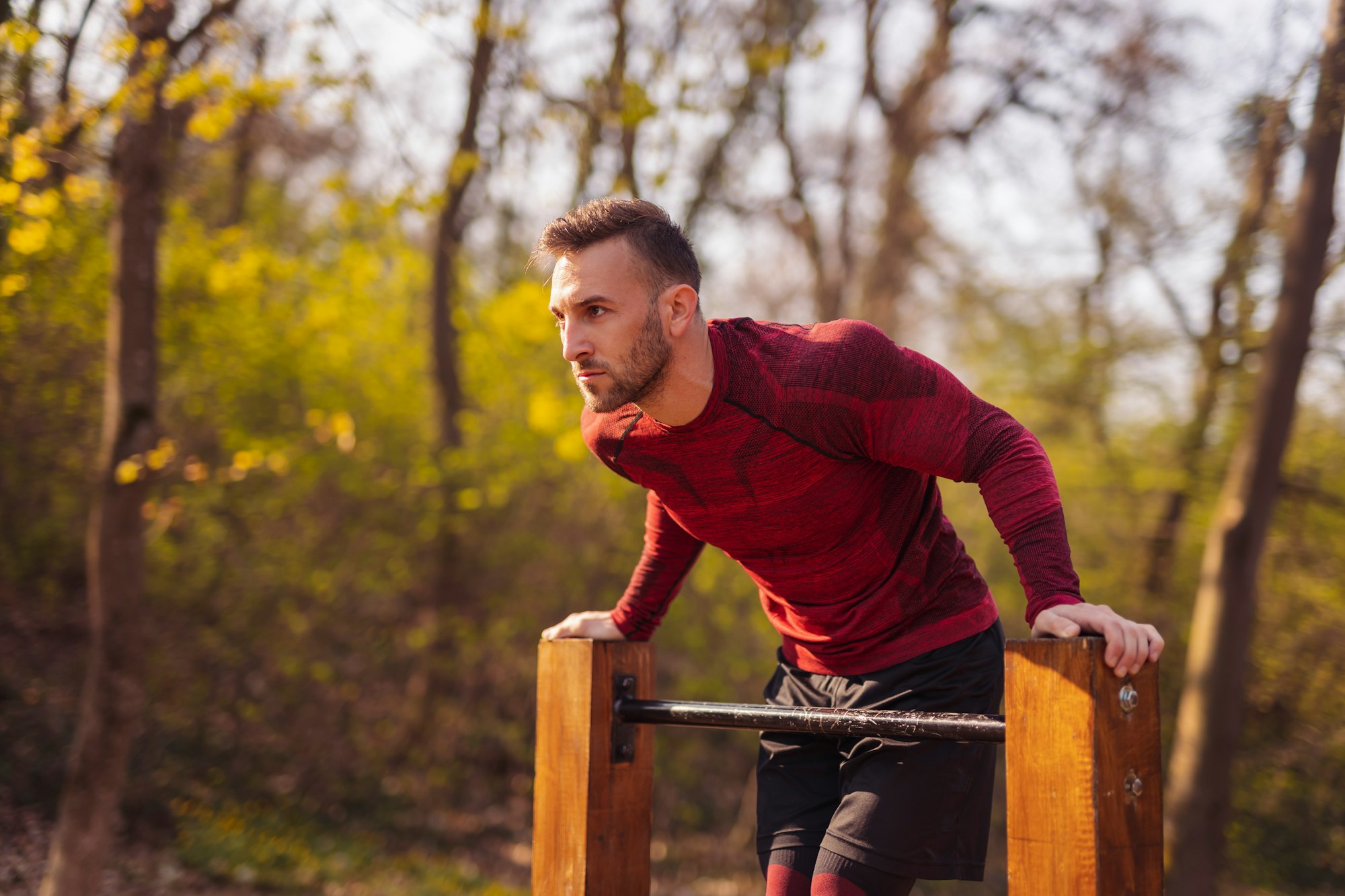 Man working out in street workout park